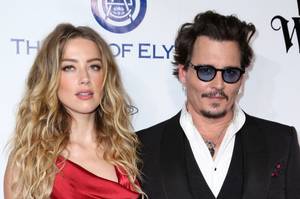 据称妻子打击者约翰尼·德普（Johnny Depp）品牌琥珀色听到了“败类”