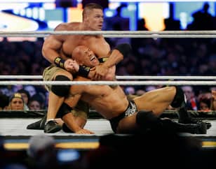 约翰·塞纳（John Cena）在摔跤狂热29战斗后揭示了他告诉岩石