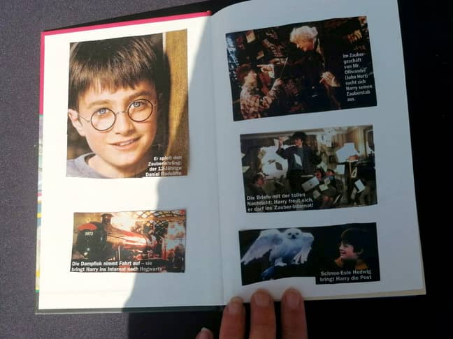 其中一个孩子将哈利·波特电影中的照片粘在书中。信用：SWNS