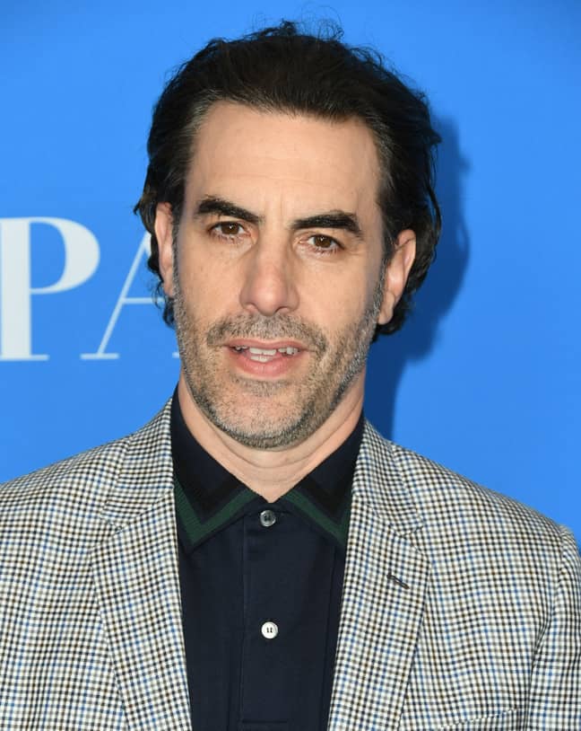 萨莎·巴伦·科恩（Sacha Baron Cohen），饰演博拉特（Borat）。信用：PA“width=